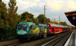 182 013-3 schob am Abend des 8.6.13 den RE1 nach Magdeburg Hbf. am S-Bahnhof Nikolassee vorbei.