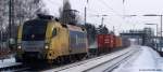 ES 64 U2-008 rollte am 30.01.10 mit einem Gz durch den Bhf. Ashausen.