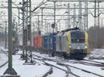 041. BoXpress 182 507-4(U2-007) kam mit 94 80 0185 570-9(??) und einem langen Containerzug an uns vorbei gefahren. HH 6.3.10