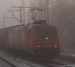 185 587-3 der HGK rollt am 27.11.10 durch den Harburger Bahnhof.