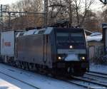 185 564-2 fhrt am 21.12.10 durch den Bhf. Hamburg-Harburg.