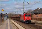 Die frisch HU Untersuchte 185 014-8(IS 770,LMR 9,21.02.11) beehrte Schleswig mit einem Schotterwagenzug bei bestem Wetter. 19.3.11