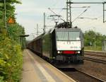185 554-3 die mit 4 Pathos ausgestattete E-Lok der MRCE verliehen an CFL Cargo rollt sauber und poliert....durch Schleswig. 26.5.11