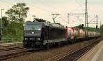 185 574-1 die auch fr CFL Cargo unterwegs ist rollt hier mit dem DGS 348 durch Schleswig. 26.5.11