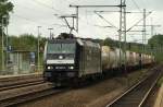 185 567-5 CFL Cargo/MRCE mit dem Kalkmehlzug fotografiert in Schleswig. 30.8.11