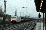 185 637-6 Railpool/PCT rollt hier gemtlich mit einem  Autotransportzug durch Bremen. 03.12.11