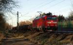 185 124-5 fhrt am 6.1.12 mit einem Stahlrollenzug bei Bienenbttel weiter gen Sden.