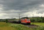 Mit einem Kesselwagenzug durchfuhr 185 028-8 die Gemeinde Haunetal-Neukirchen am 6.7.12 in Richtung Bad Hersfeld