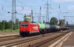 185 631-9 zieht am 4.7.12 einem ler durch Berlin Schnefeld Flughafen.