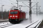 Neu am Sonntag ist der DGS 45699 der hier mit 185 404-1 der TXL durch Schleswig  staubt . 10.03.2013