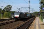 185 408-2 der MRCE/TXLA durchfhrt Schleswig mit dem DGS 45699 am Haken. Schleswig 25.08.2013