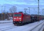 DB 185 336-2 mit einem gemischten Gterzug aus Padborg hier bei der Durchfahrt in Schleswig. Gru an den Tf ! 12.2.10