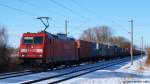 185 297-9 zog am 06.03.10 einen langen Gz durch Hamburg-Moorburg auf dem Weg zur Hauptstrecke Hamburg-Cuxhaven.