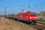 Mit einem KLV-Zug verlt die 185 289 am 02.04.2010 Rostock-Seehafen.