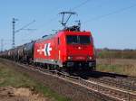 185 582-4 von HGK fuhr mit einem Kesselwagenzug durch Ochtmissen bei Lneburg am 17.4
