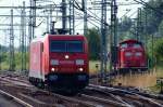 Alt und Neu !! 185 235-9 und die  modernisierte  212 034-3 fotografiert in HH-Harburg. 15.7.10