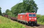 Im schnsten Fotolicht durchfhrt 185 248-2 mit einem Gz aus Hannover auf dem Weg nach........Ahlten, den 10.7.10