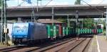 185 519-6 der VPS zog einen langen Containerzug durch Harburg.