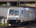 185 673-1 von Railpool fhrt am 4.9.10 durch den Bhf. Hamburg-Harburg durch.