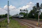 186 148-3 Captrain mit Getreidezug in Dieskau Richtung Leipzig unterwegs. 19.07.2011