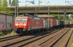 189 056-5 kam nach ihrer Solodurchfahrt mit vielen bunten Paketen am Haken wieder zurck. 7.5.11