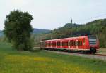 BR 0425/137320/425-310-9-donnerte-von-backnang-kommend 425 310-9 donnerte von Backnang kommend als Regionalbahn nach Murrhardt durch Bartenbach am 24.4.11.