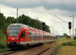 Ein unbekannt gebliebener Flirt fuhr als RE 9 nach Sassnitz in den Haltepunkt Sagard am 23.7.10               
