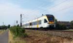 ET 7.10 der eurobahn fhrt am 4.6.11 als RE 3 nach Hamm (Westf) bei Nordbgge durch die Landschaft.