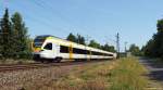 ET 7.12 der eurobahn fhrt am 4.6.11 als RE 3 nach Dsseldorf Hbf. bei Nordbgge durch die Landschaft.