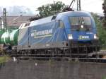 1116 912-5 der  Mittelweser-Bahn  bei einem Zwischenhalt im  Bahnhof von Prien am Chiemsee.