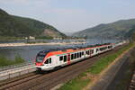 428 638 der  Rheingau Linie  auf dem Weg nach Bingen. Aufgenommen am 3. Mai 20222 bei Assmannshausen.