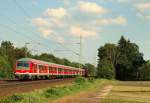 Eigene Bilder/144266/ein-n-wagenzug-rauschte-als-regionalbahn-nach Ein N-Wagenzug rauschte als Regionalbahn nach Itzehoe durch Halstenbek am 10.6.11.