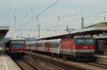 Eine Stunde vorher traffen sich 628 112 der SOB als RB nach Mhldorf und 1144 105 mit dem Regionalzug nach Linz im Passauer Bahnhof am 28.7.11.