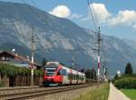 Auf dem Weg zum Brenner war 4024 074-9 und rauschte als Regionalzug durch Schwaaz am 2.8.11. 