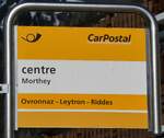 (285'042) - PostAuto-Haltestellenschild - Morthey, centre - am 24. Februar 2026