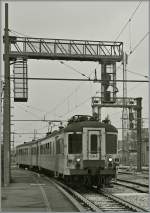 Der Ale 228 064 (Hersteller: BN, ACEC; Bauart: (A1)' (1A)' + (A1)' (1A)' Baujahr: 1954) ex SNCB 54 verlässt Modena mit dem Ziel Sassuolo.