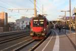 1116 214-8 bei der Ausfahrt aus dem Salzburger Hauptbahnhofs am 6.