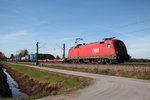 1116 280-9 mit einem Containerzug am 1.