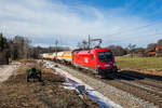 1116 101 mit einem gemischten Gterzug auf dem Weg nach Freilassing.