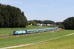 1116 244 mit dem  Klima-Railjet  aus Salzburg kommend am 15. August 2024 bei Axdorf im Chiemgau.