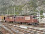 BLS Re 4/4 166 - 173, ab 1970; die BLS Re 4/4 172  Egggerber  und eine weitere sind in Brig unterwegs.