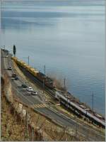 Reger Bahnverkehr am Genfer See: Ein Flirt fährt Richtung Villeneuve, und zwei Re 4/4 II fahren mit dem Marti-Zug Richtung Lausanne.
8. Jan. 2014