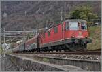 Die SBB Re 4/4 II 11348 (Re 420 348-5) ist mit einem kurzen Güterzug bei Villeneuve unterwegs. 

27. Feb. 2024