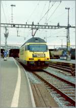 Die erste  Western Union  Werbelok Re 460 114-2 in Zrich HB.
Frhjahr 1998.