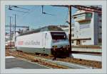 Die SBB Re 460 033-4 wirbt fr  ascom   Gescanntes Negativ/Lausanne im Jahre 1997