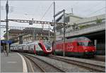 IC West-Ost Züger heute und morgen: Heute verkehren die IC1 Züge mit Re 460 und Doppelstockwagen, morgen sollen sie mit den Twindexx Doppelstocktriebwagen  verkehren. Im Bild neben der SBB Re 460, der Der vierteilige SBB Twindexx RABDe 502 405-9  Rorschach  (UIC 94 85 0 502 405-9 CH-SBB) auf einer Testfahrt in Lausanne unter einem neuen Signal auf Gleis 2. 

6. Juni 2019 