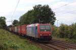 Re 482 000-7 strebt am 1.9.12 mit einem Containerzug durch Ahlten.