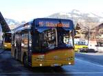 (257'937) - Mock+Weber, St. Pelagiberg - TG 203'882/PID 5565 - Solaris (ex PostAuto Ostschweiz; ex PostAuto Graubnden; ex PostAuto Ostschweiz; ex Postautobetriebe Unteres Toggenburg, Ltisburg) am 25. Dezember 2023 beim Bahnhof Gstaad