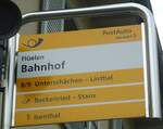 (133'580) - PostAuto-Haltestellenschild - Flelen, Bahnhof - am 10.