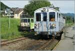 Die Front der in Blonay abgestellte MOB GDe 4/4 6006 bietet einen schönen Hintergrund zum einfahrenden MOB BCFe 4/4 N° 11 der Blonay Chamby Bahn, der mit dem letzten Zug des Tages in den Bahnhof einfährt. 

13. Juli 2024 